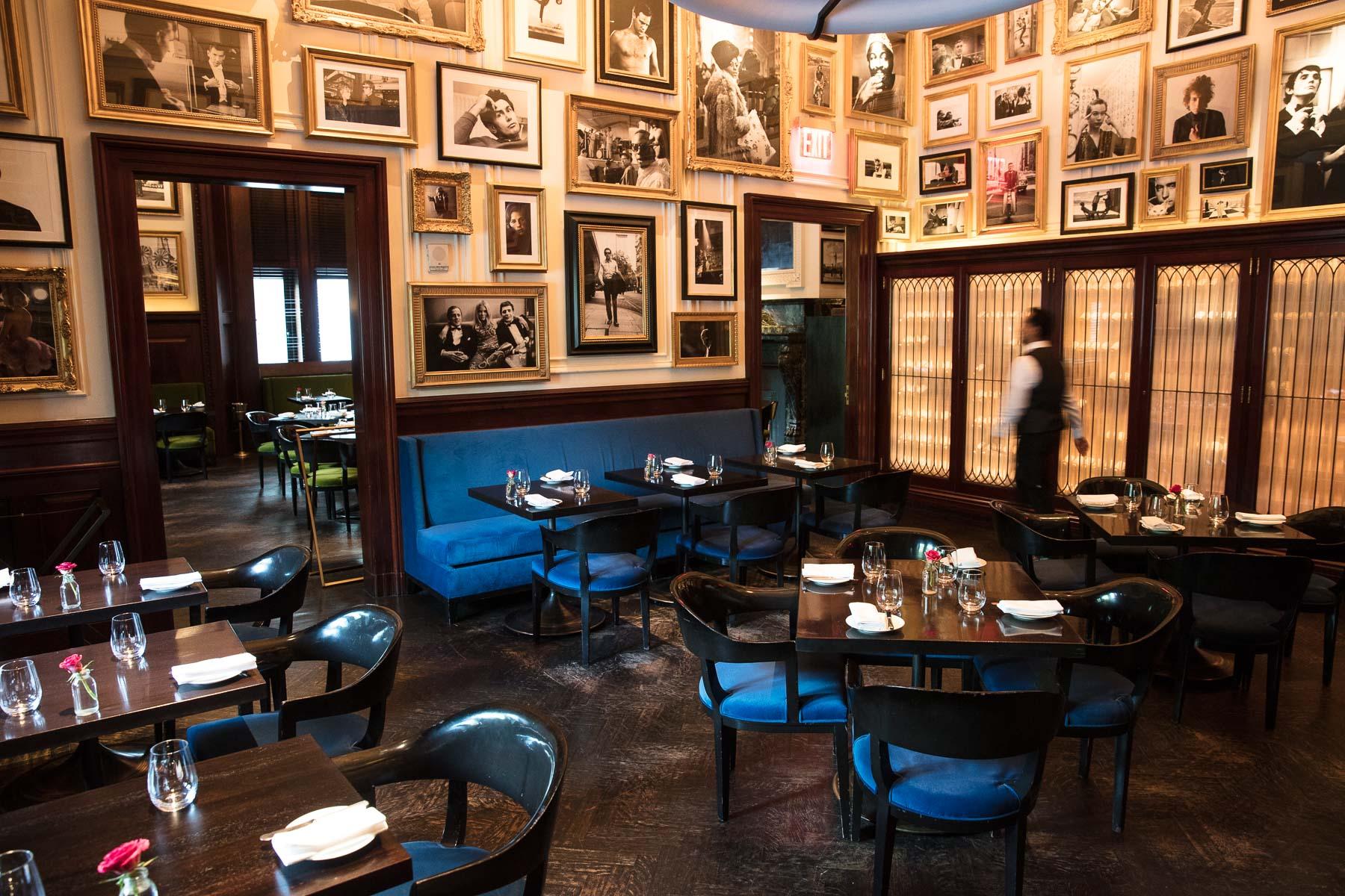 The Clocktower restaurant interior in New York, its warm practical lighting balanced against cool window light