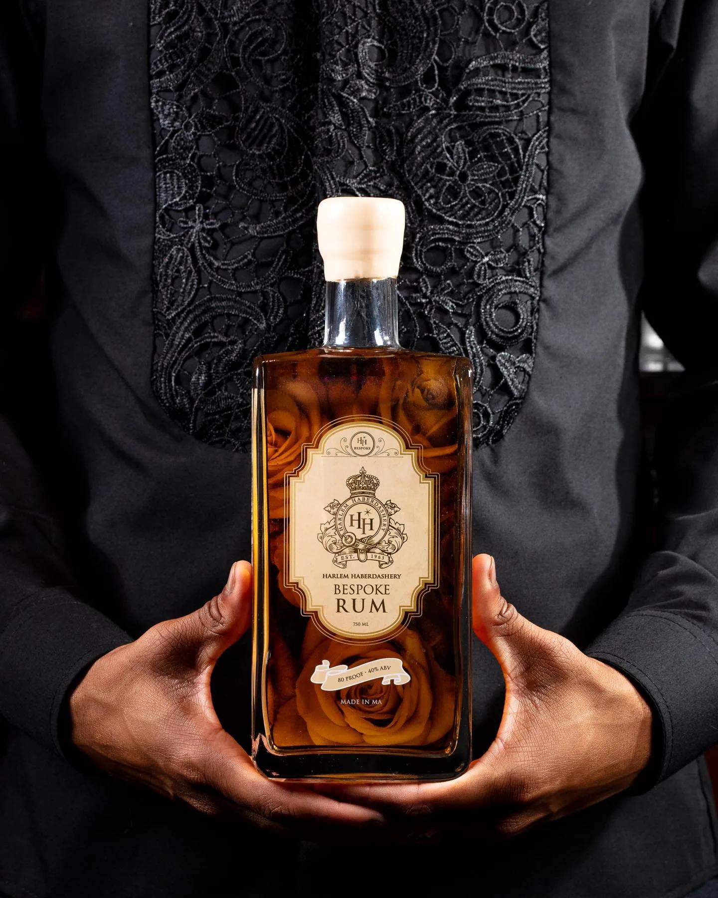 HH Bespoke Rum bottle product photography on dark background