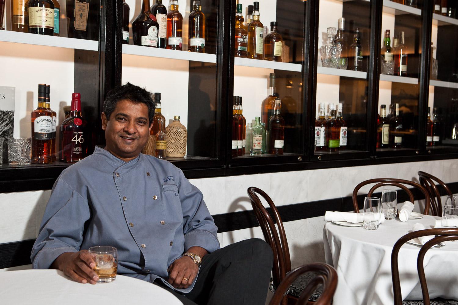 Floyd Cardoz smiling portrait in restaurant