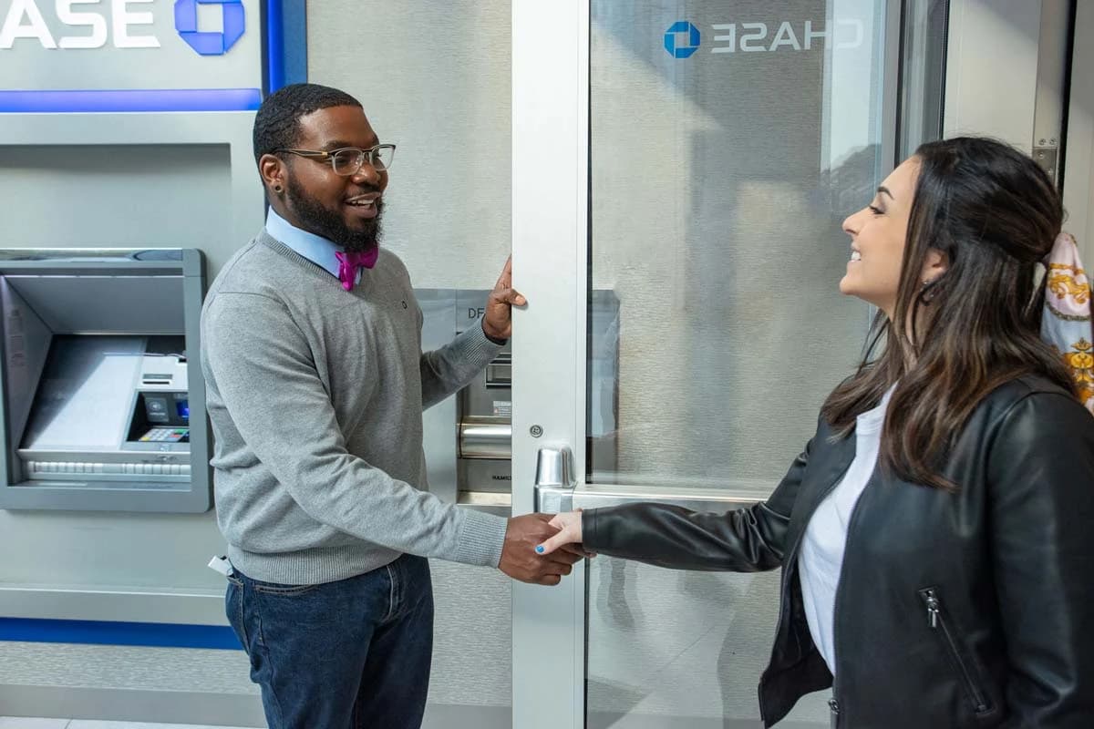 Chase bank employees helping customers