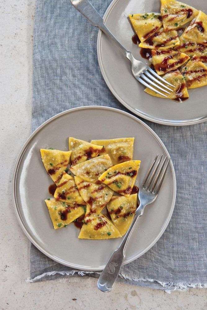 Handmade duck ravioli pasta dish with sage butter sauce