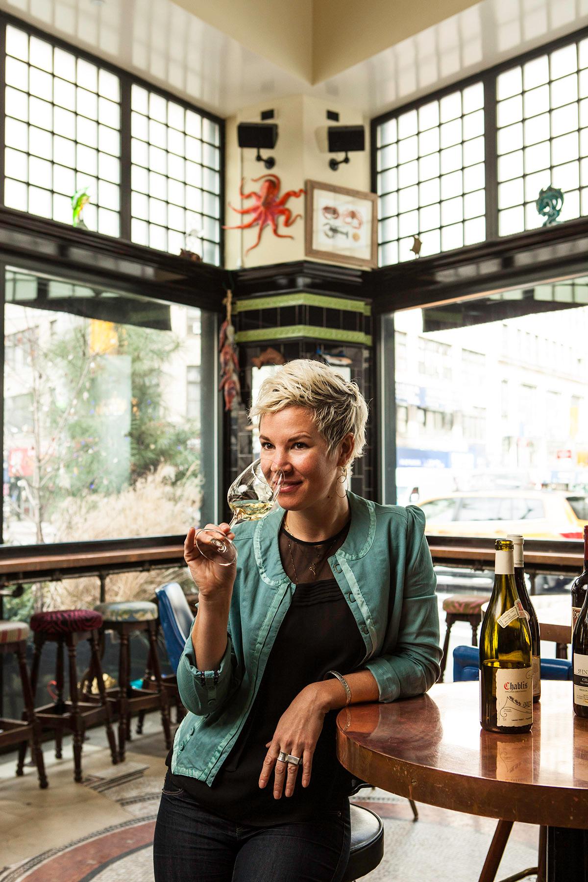 Carla Hall posing with fresh ingredients