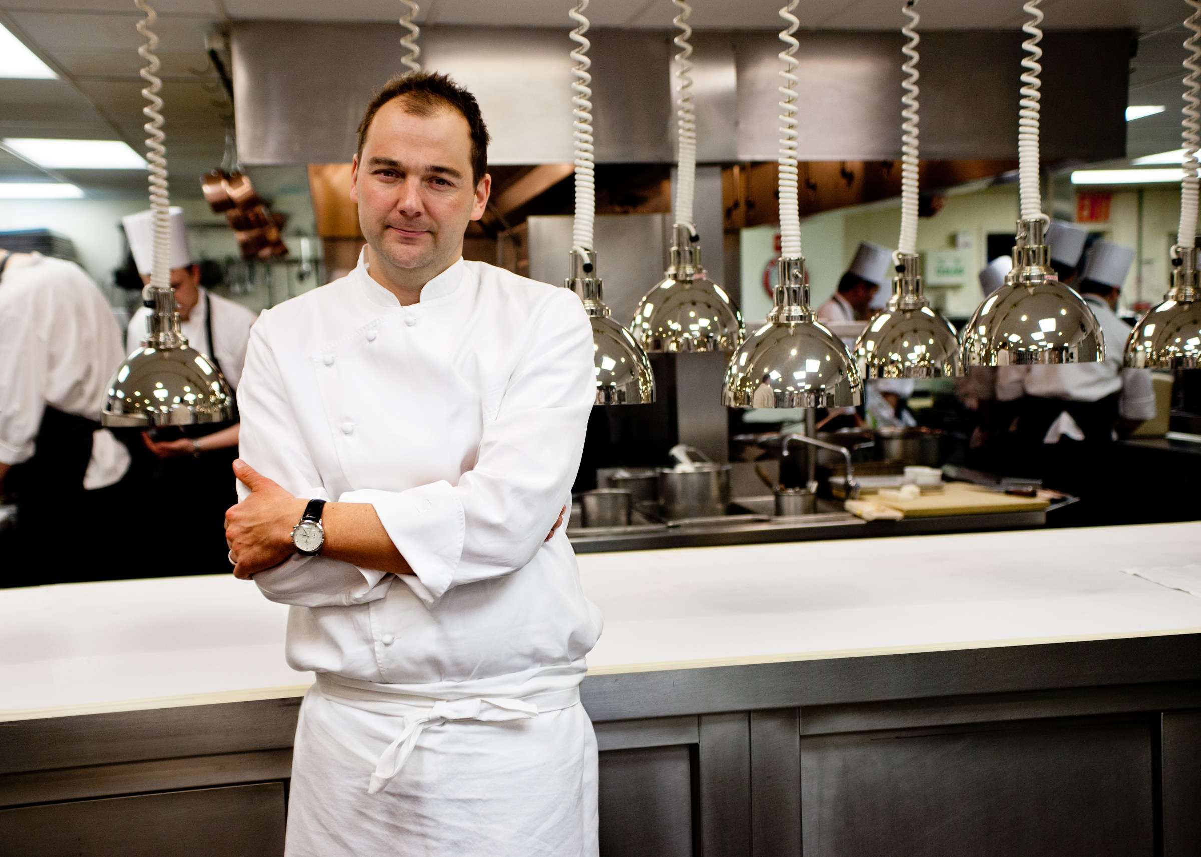 Chef Daniel Humm working in the kitchen at Eleven Madison Park