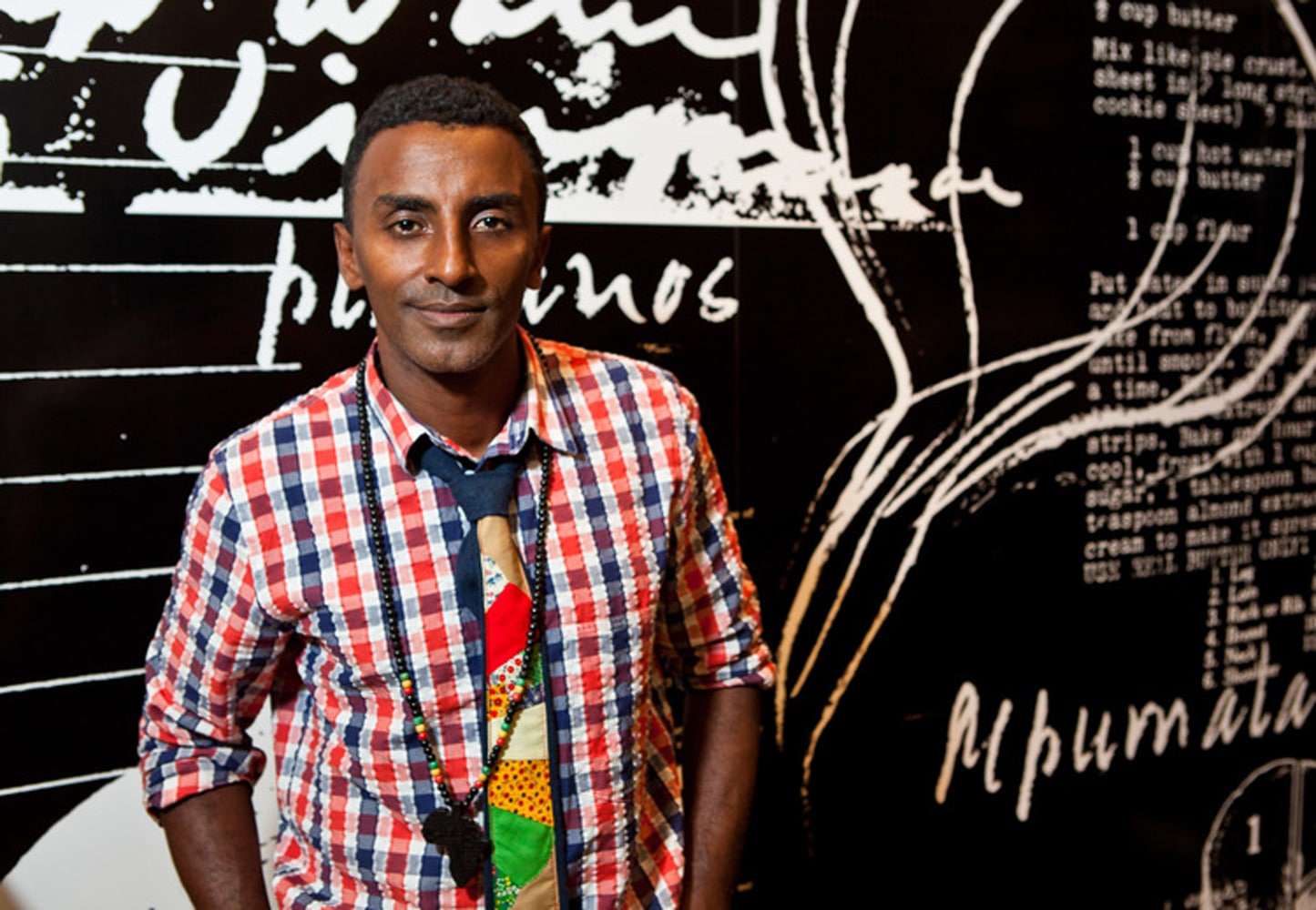 Chef Marcus Samuelsson with artistic background