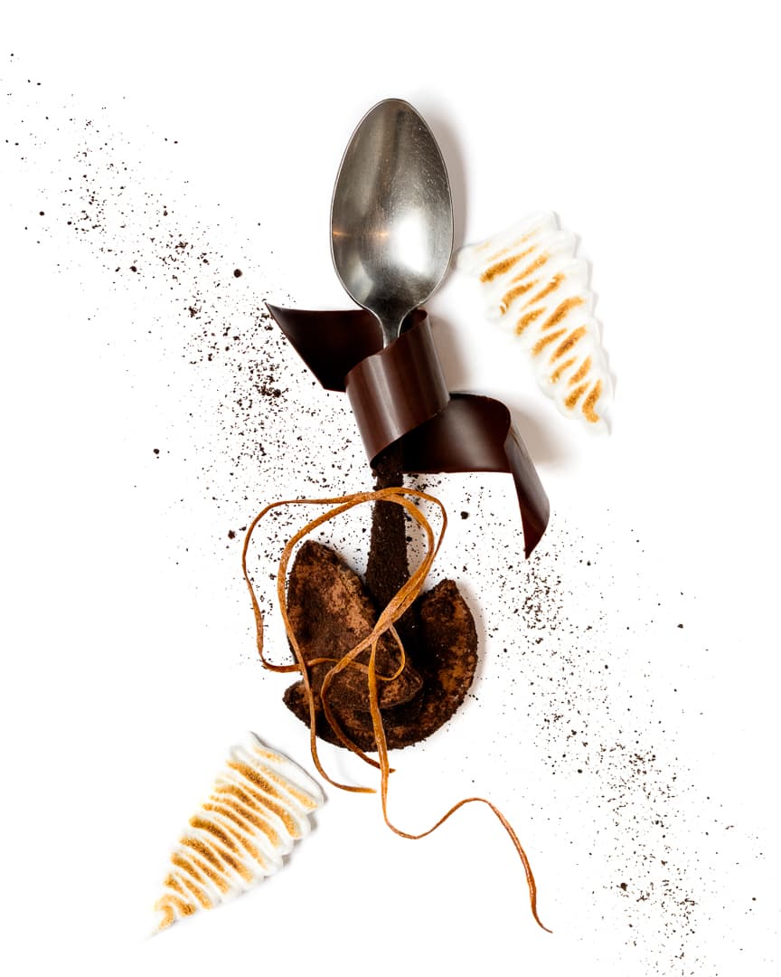 Spoonful portrait of Pastry Chef Milton Abel II titled Oreo Inspiration, featuring milk chocolate crémeux, Oreo cookie crumble, and banana crisp.