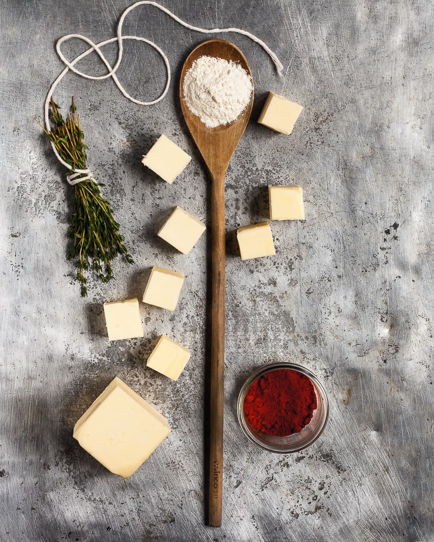 Spoonful portrait of Chef Paul Gerard titled Three Chord, featuring flour, butter, thyme, and cayenne pepper with a classic wooden spoon.