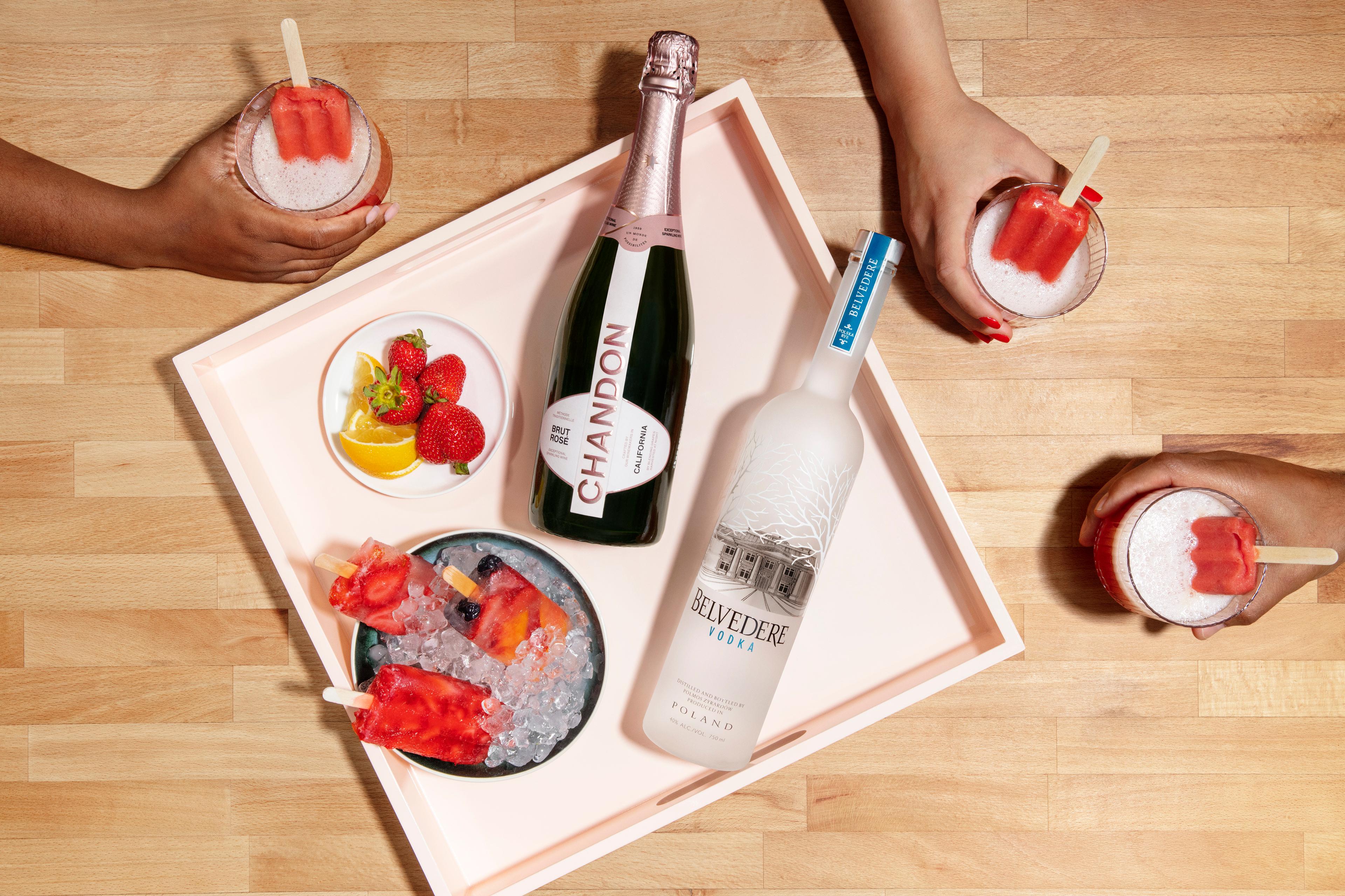 Chandon Garden Spritz and Belvedere Vodka bottles styled for luxury beverage campaign